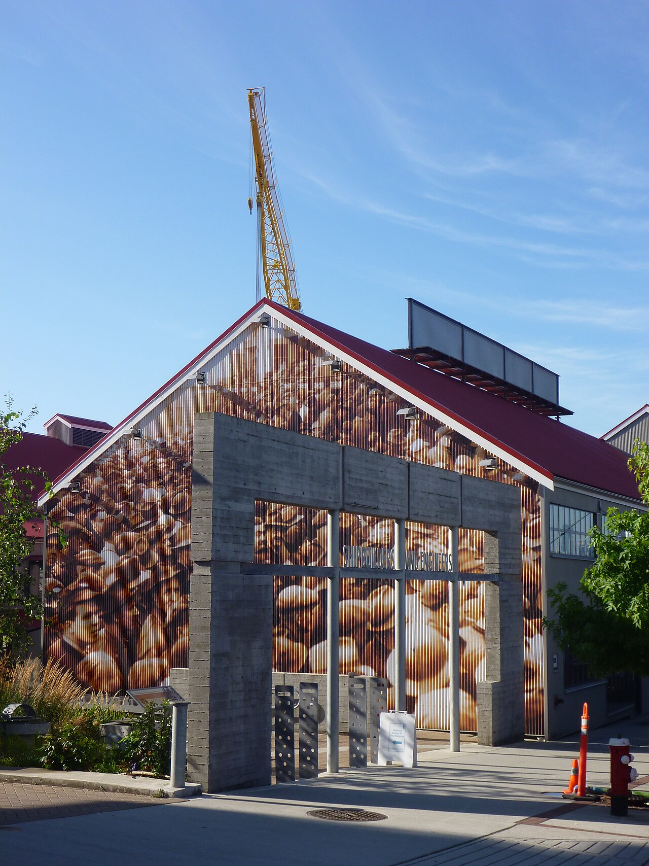 Entrance to The Shipyards in North Vancouver with a large mural